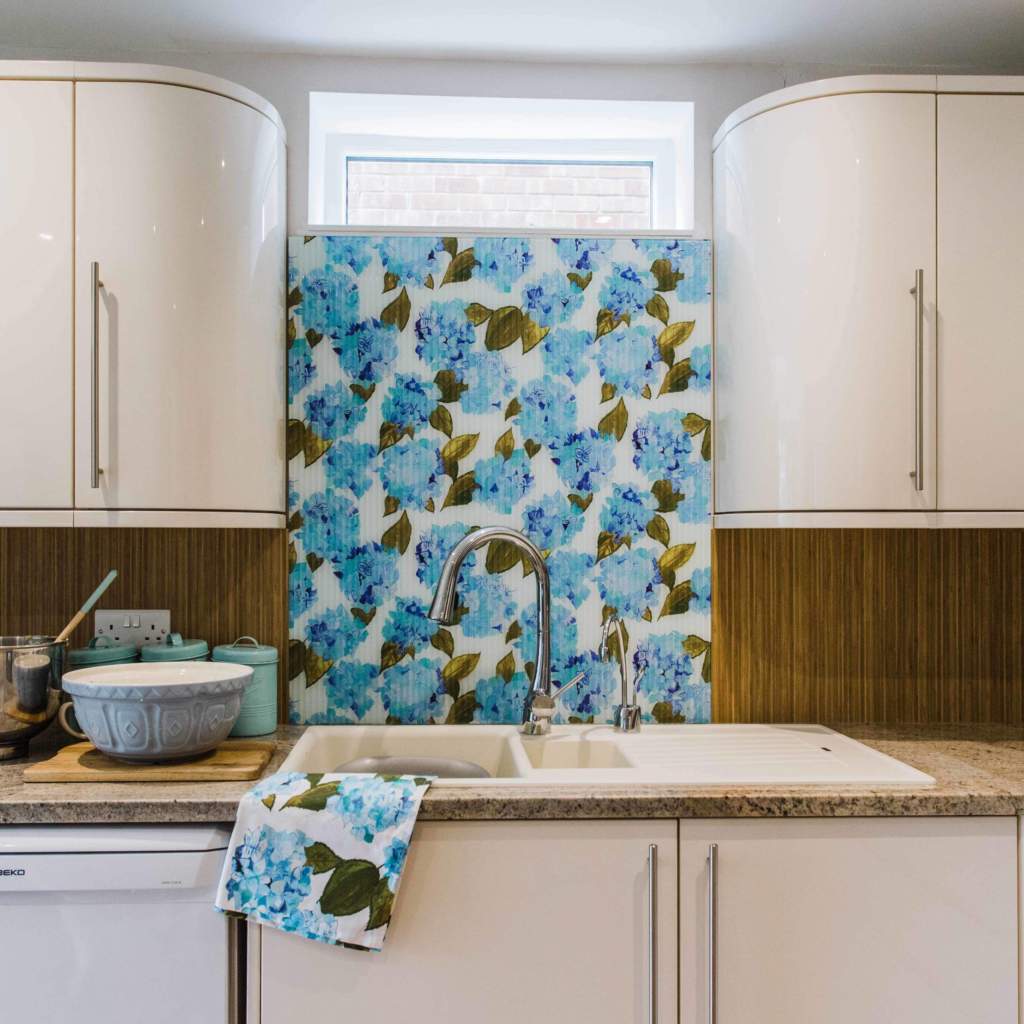 Blue & White Hydrangea Splashback with Fluted Glass by Emma Britton Decorative Glass Designer